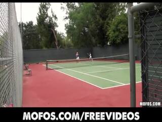 Flirty tennis MILFS are caught stretching before a match